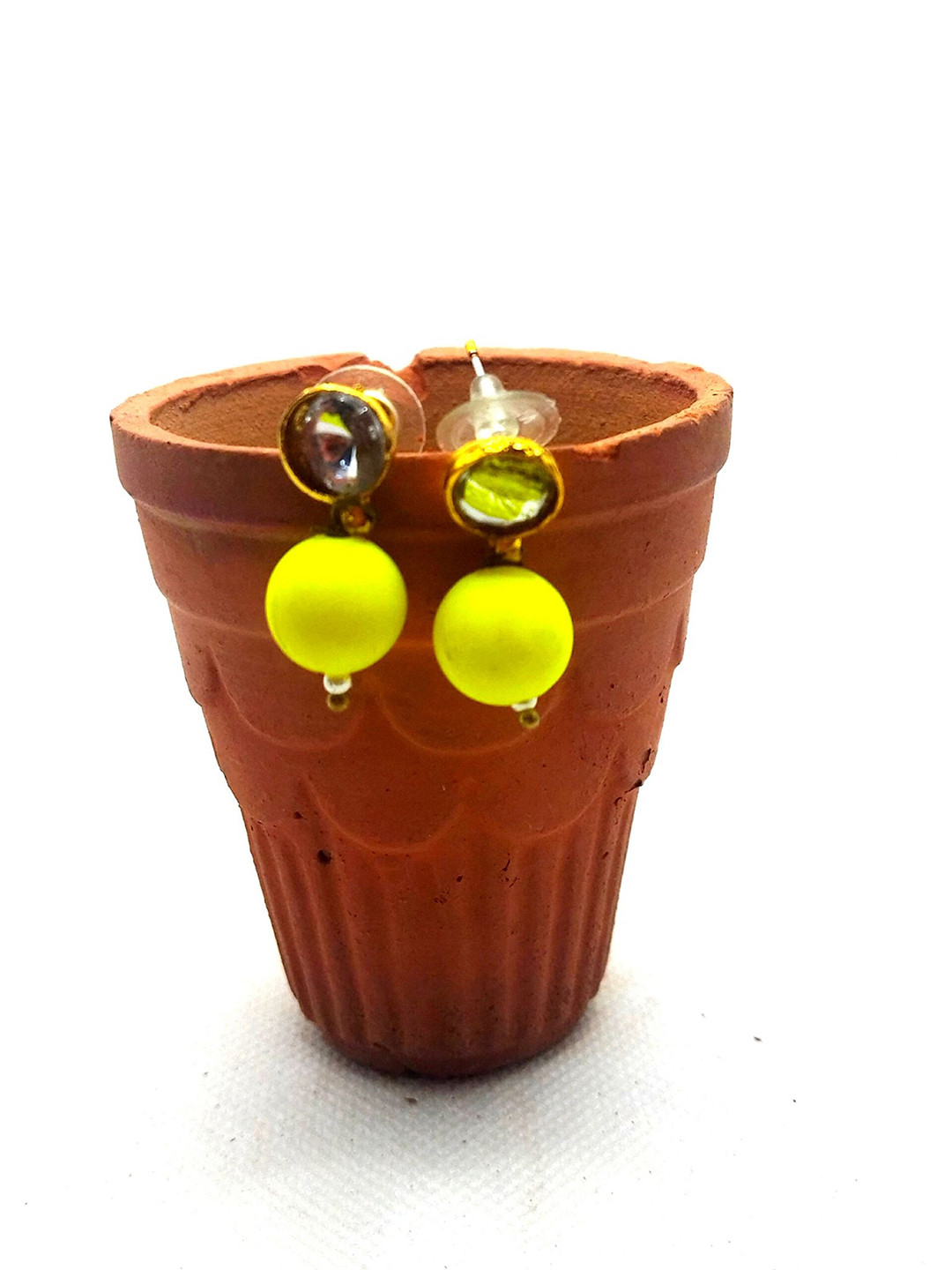 

Kshitij Jewels Yellow Teardrop Shaped Studs Earrings