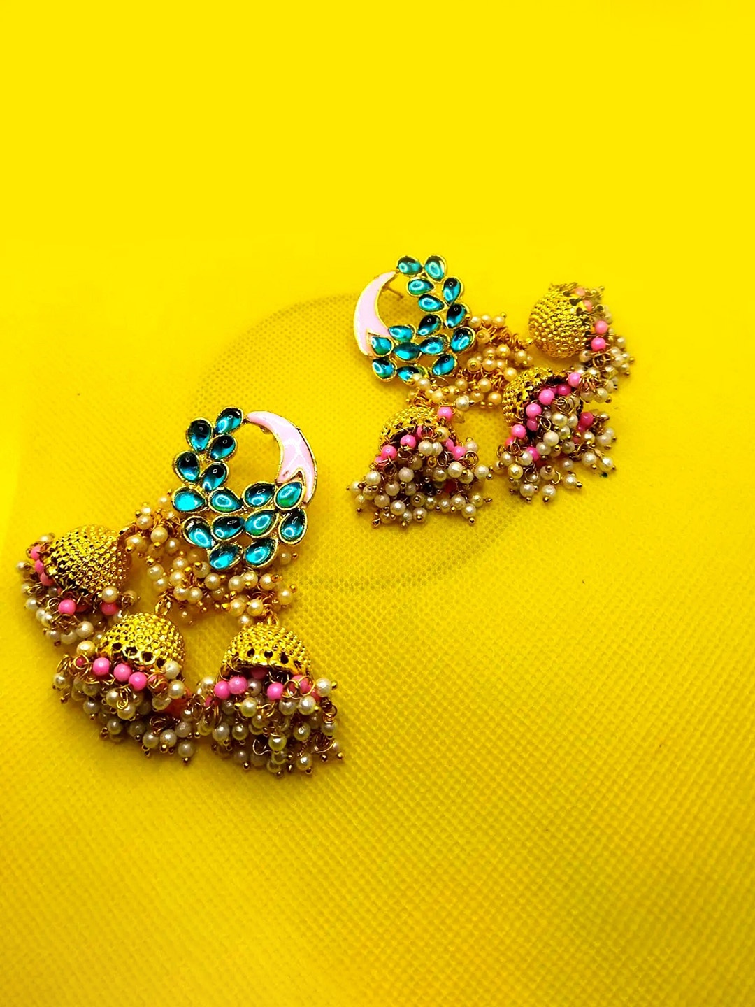 

Kshitij Jewels Women Pink & Blue Circular Jhumkas Earrings