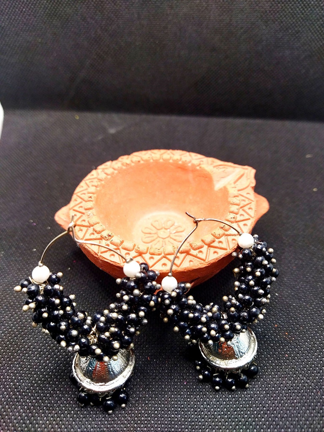 

Kshitij Jewels Women Gold-Toned & Black Circular Drop Earrings