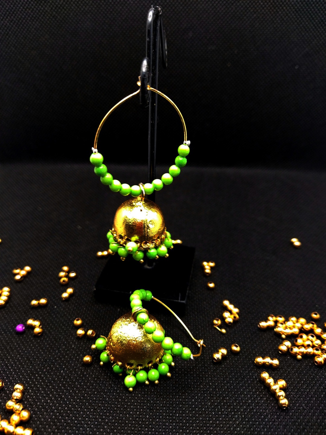 

Kshitij Jewels Women Gold-Plated & Fluorescent Green Circular Jhumkas Earrings