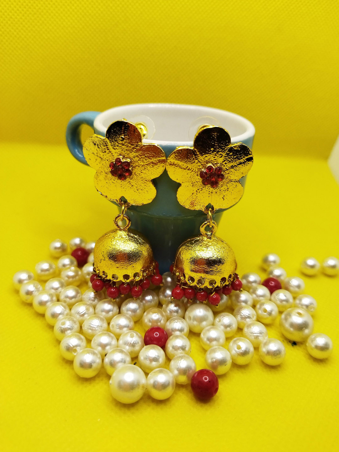

Kshitij Jewels Maroon Dome Shaped Jhumkas Earrings