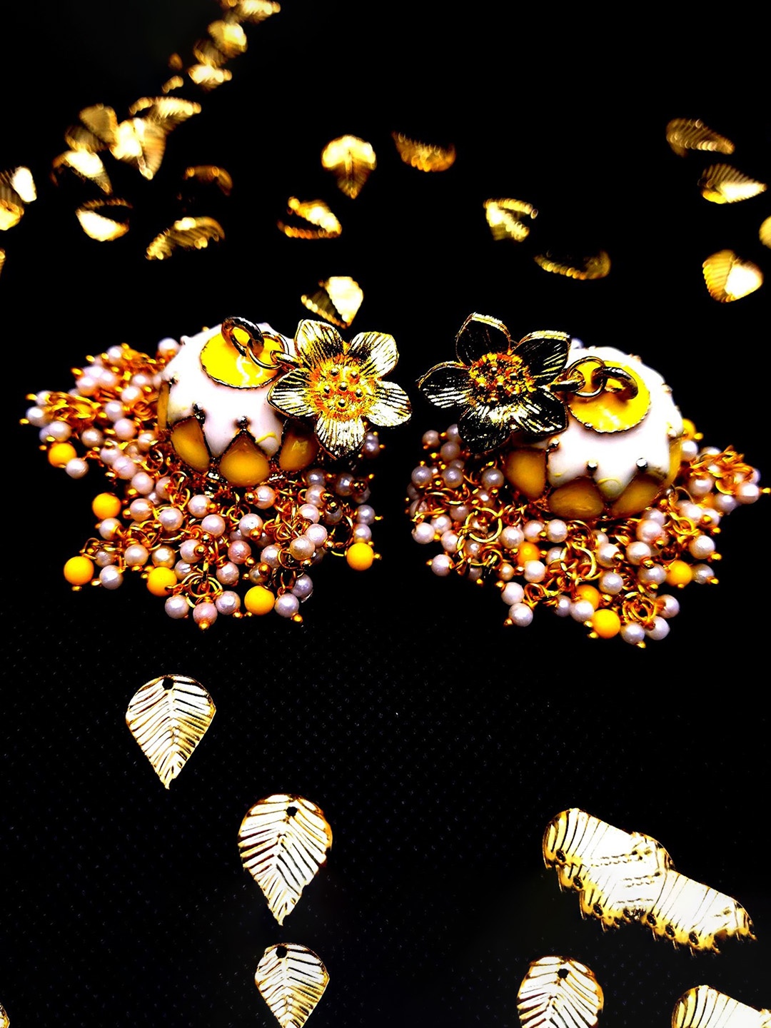 

Kshitij Jewels Off White Floral Gold-Plated Jhumkas Earrings