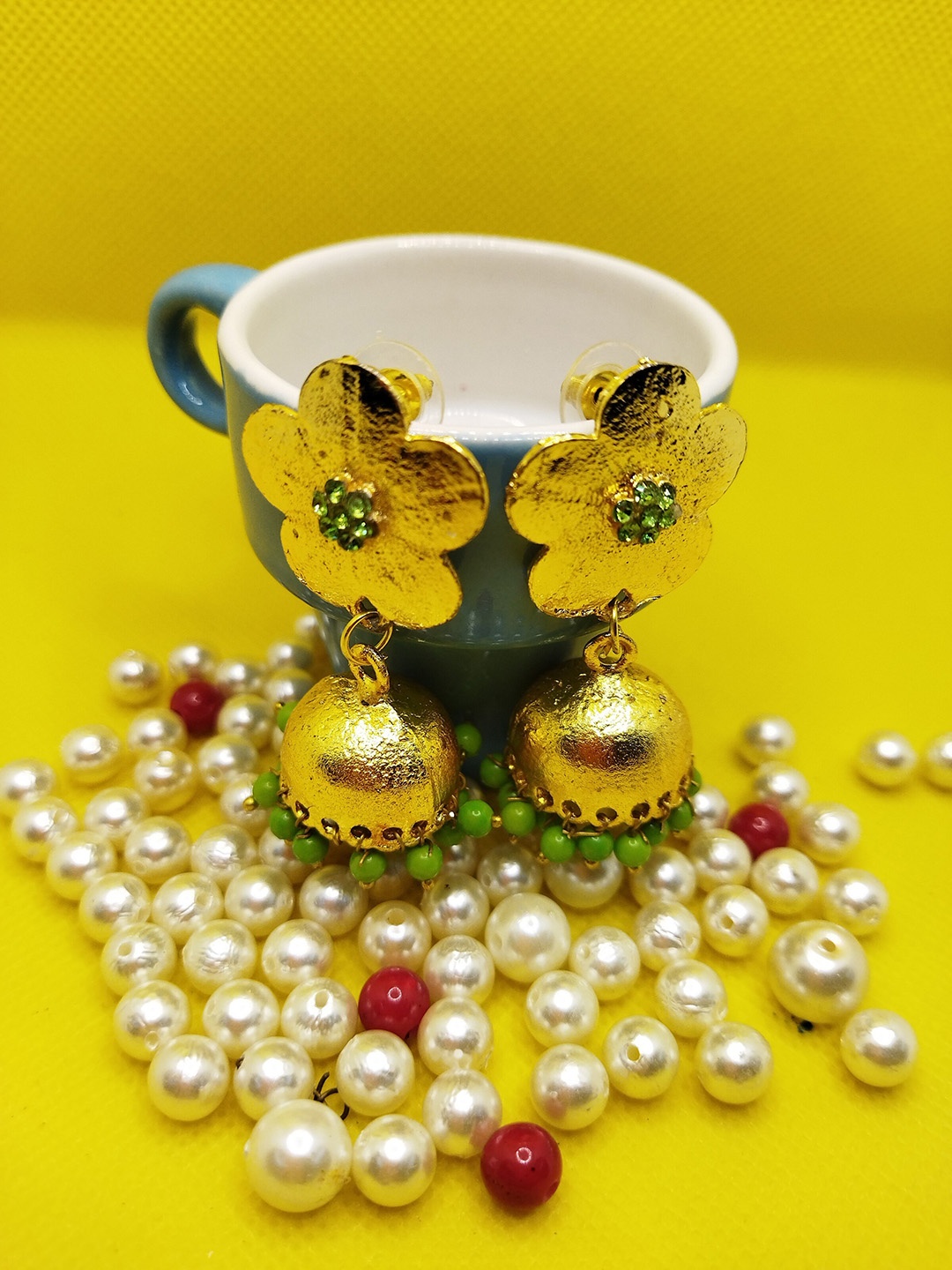 

Kshitij Jewels Women Gold-Plated & Fluorescent Green Jhumkas Earrings