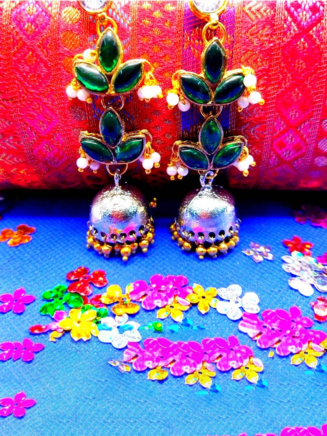 

Kshitij Jewels Women Gold-Toned & Green Leaf Shaped Jhumkas Earrings