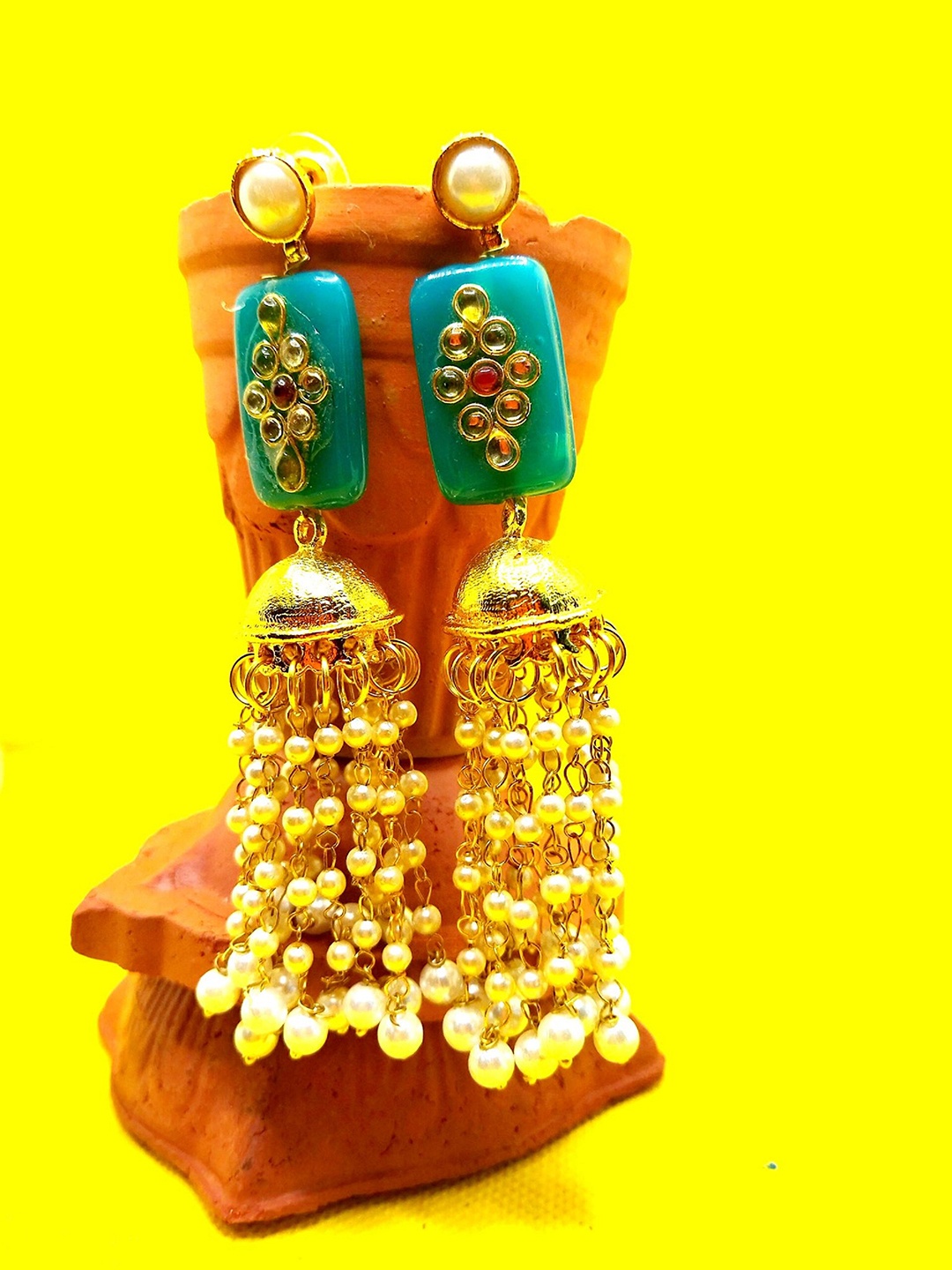 

Kshitij Jewels Women Blue & Gold-Toned Contemporary Jhumkas Earrings