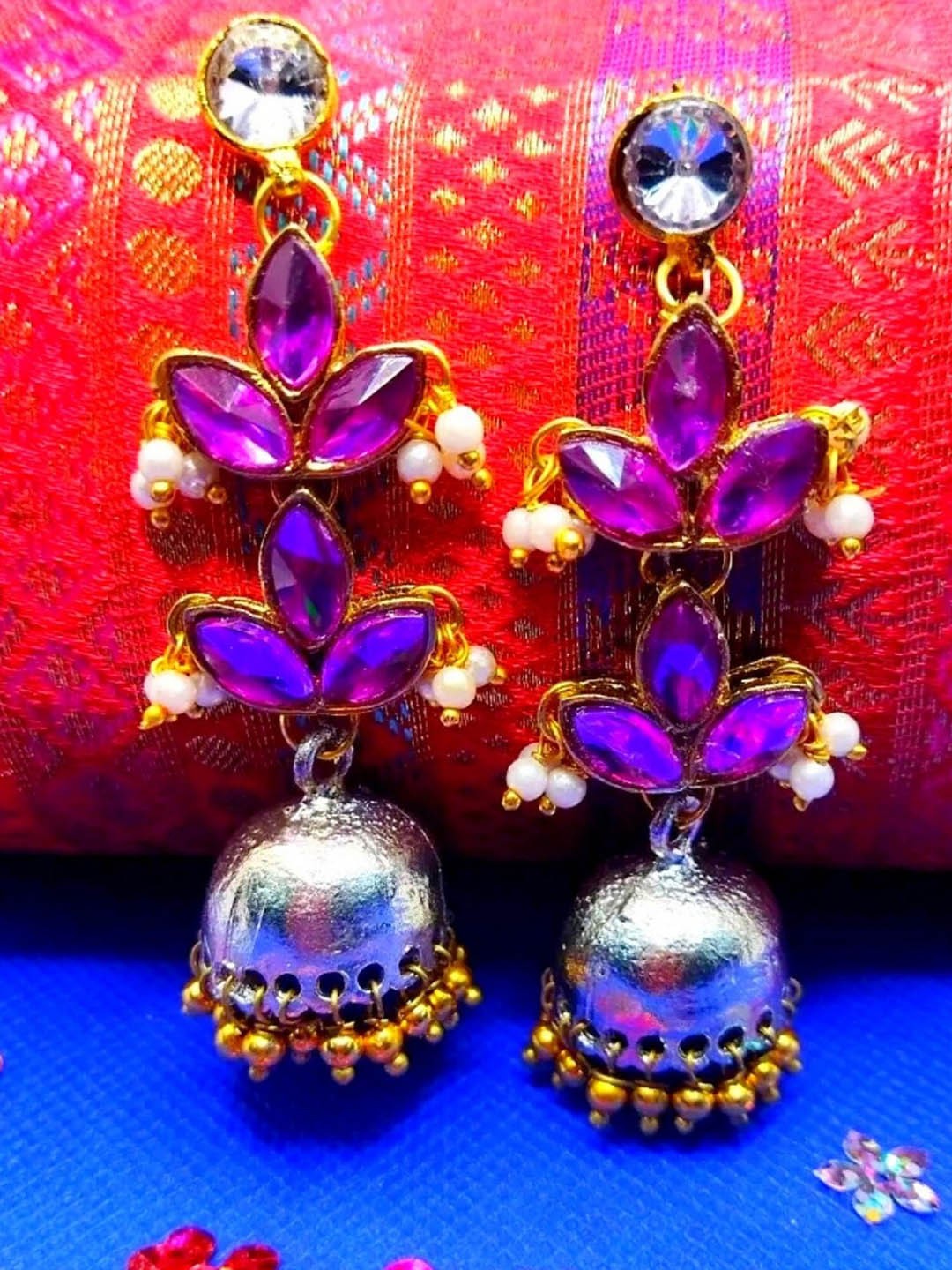 

Kshitij Jewels Purple & Gold Plated Leaf Shaped Jhumkas Earrings