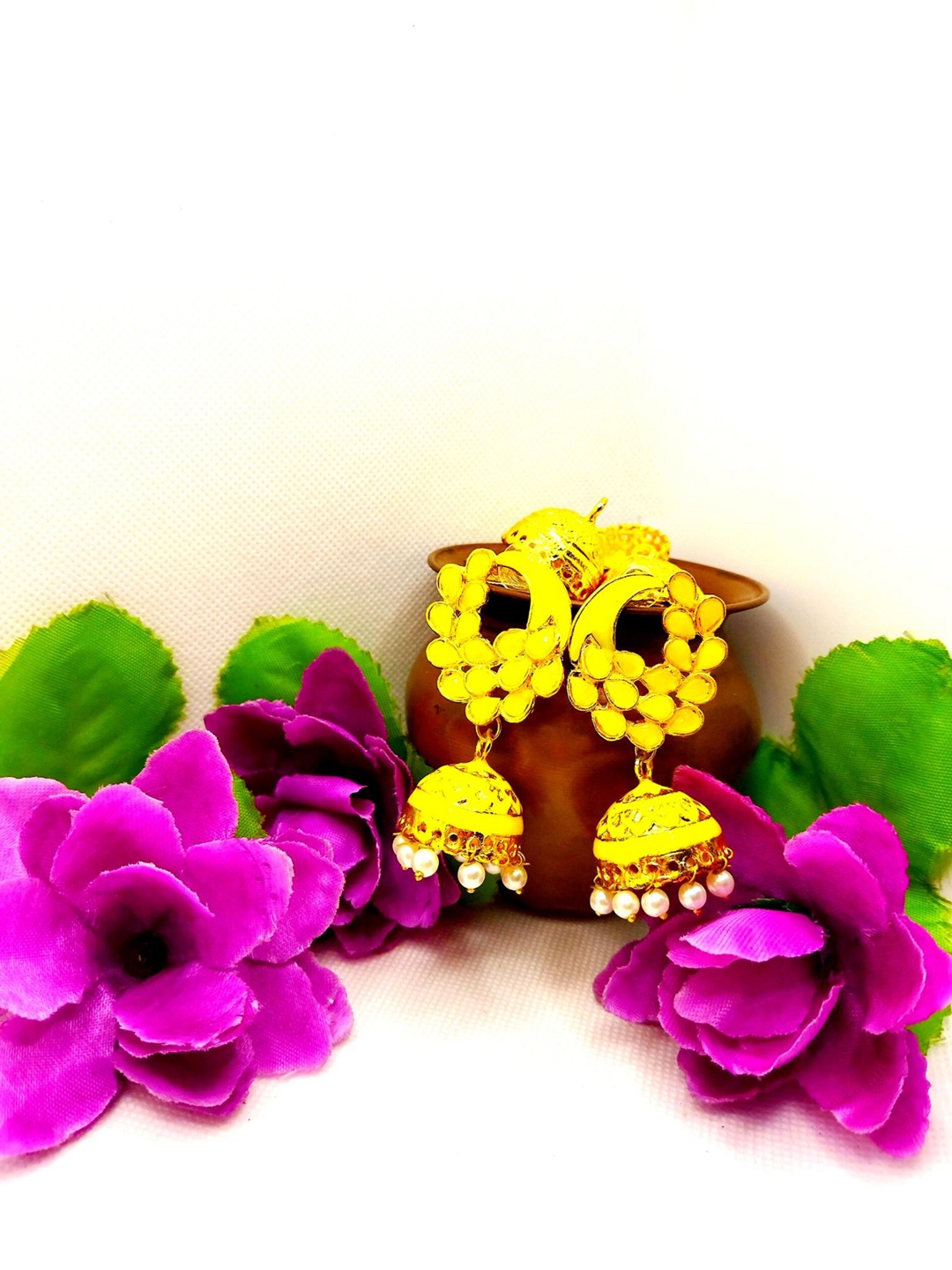 

Kshitij Jewels Yellow & White Peacock Shaped Drop Earrings