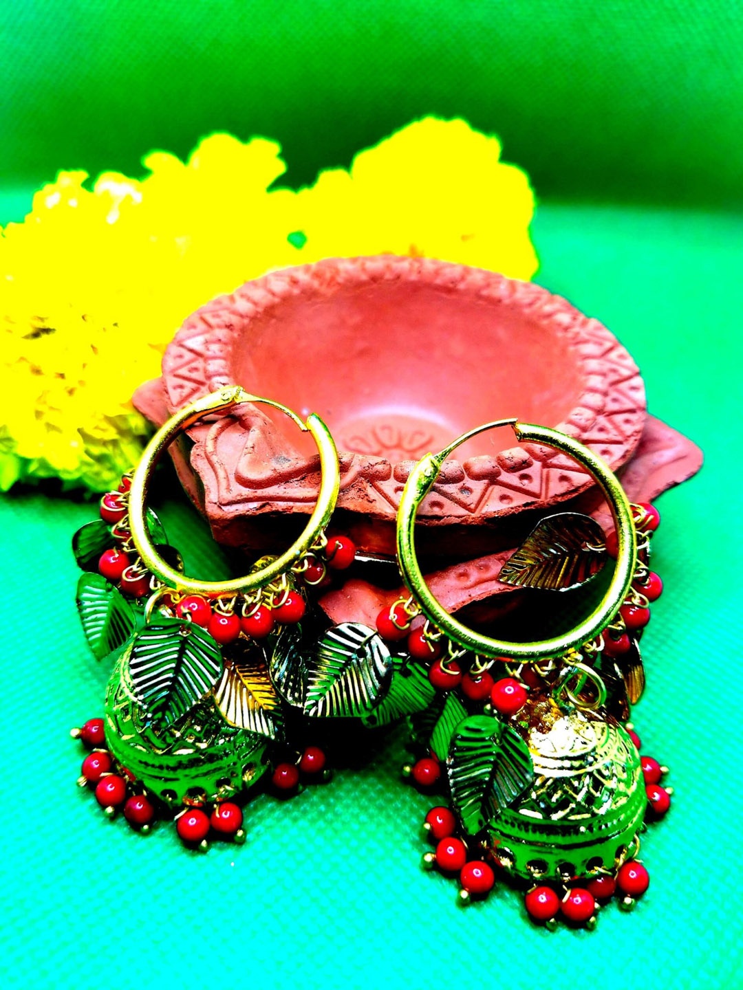 

Kshitij Jewels Fuchsia & Gold Plated Circular Jhumkas Earrings