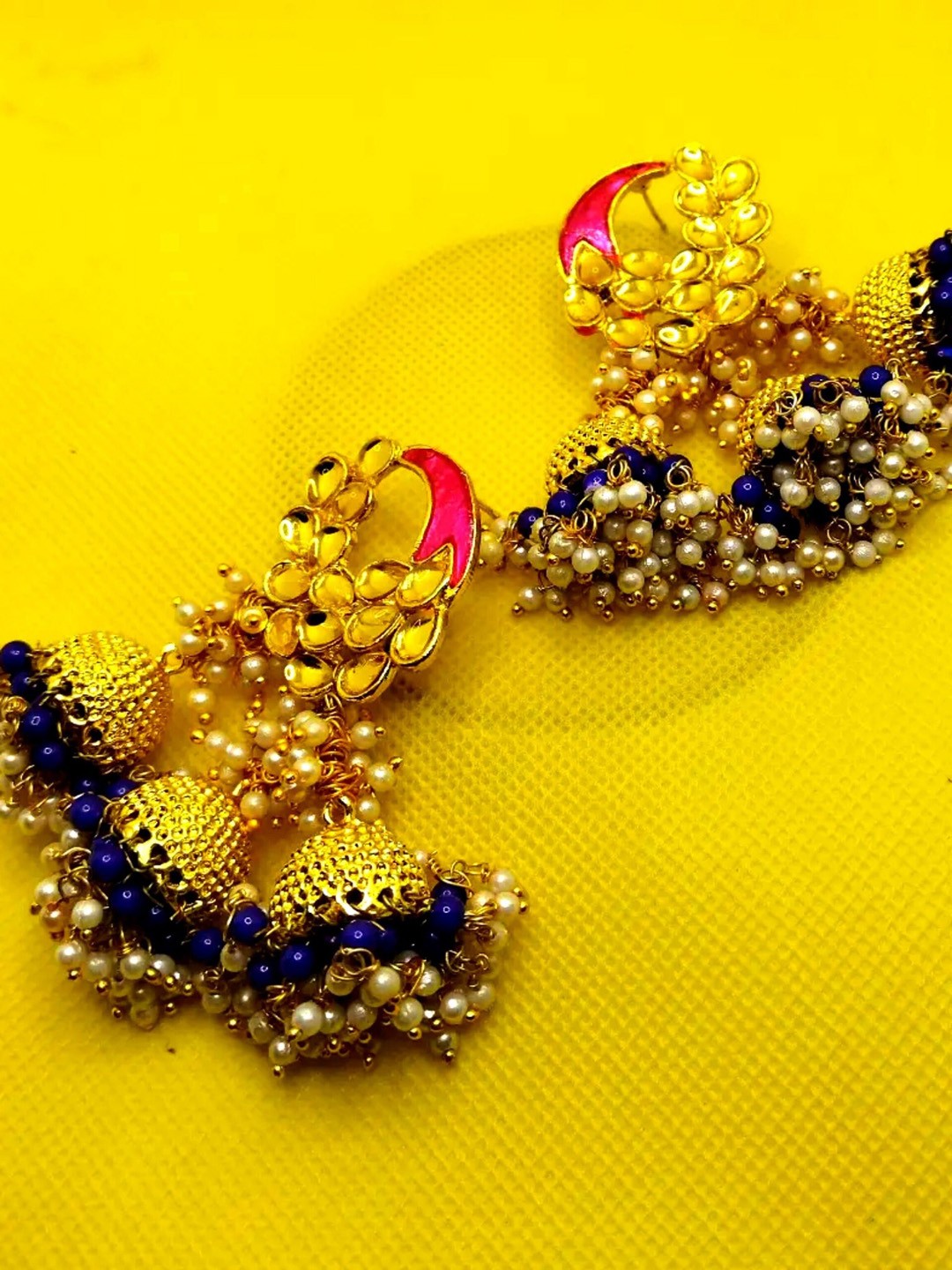 

Kshitij Jewels Gold-Plated Blue & Pink Circular Jhumkas Earrings