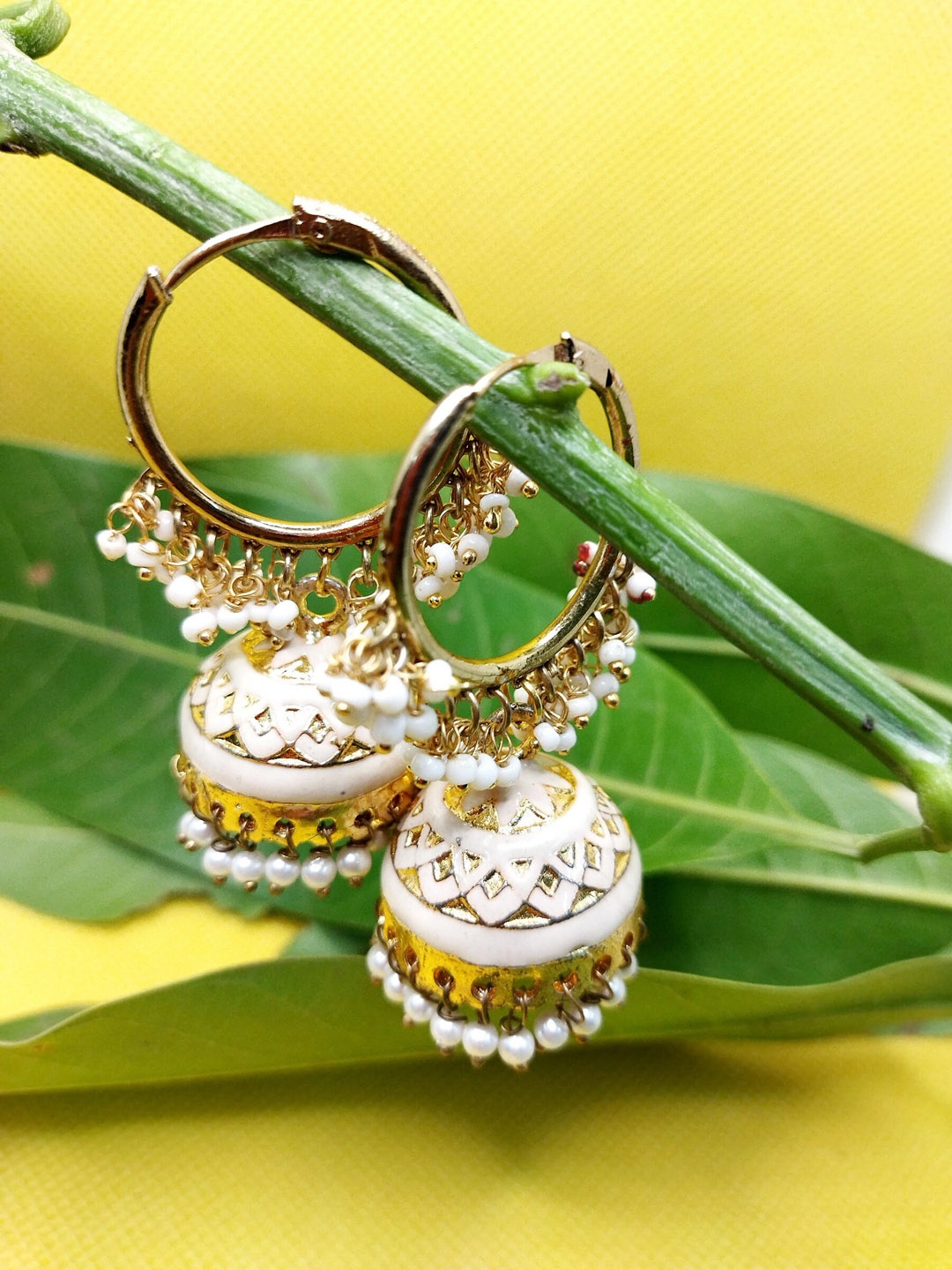 

Kshitij Jewels White & Gold-Plated Circular Jhumkas Earrings