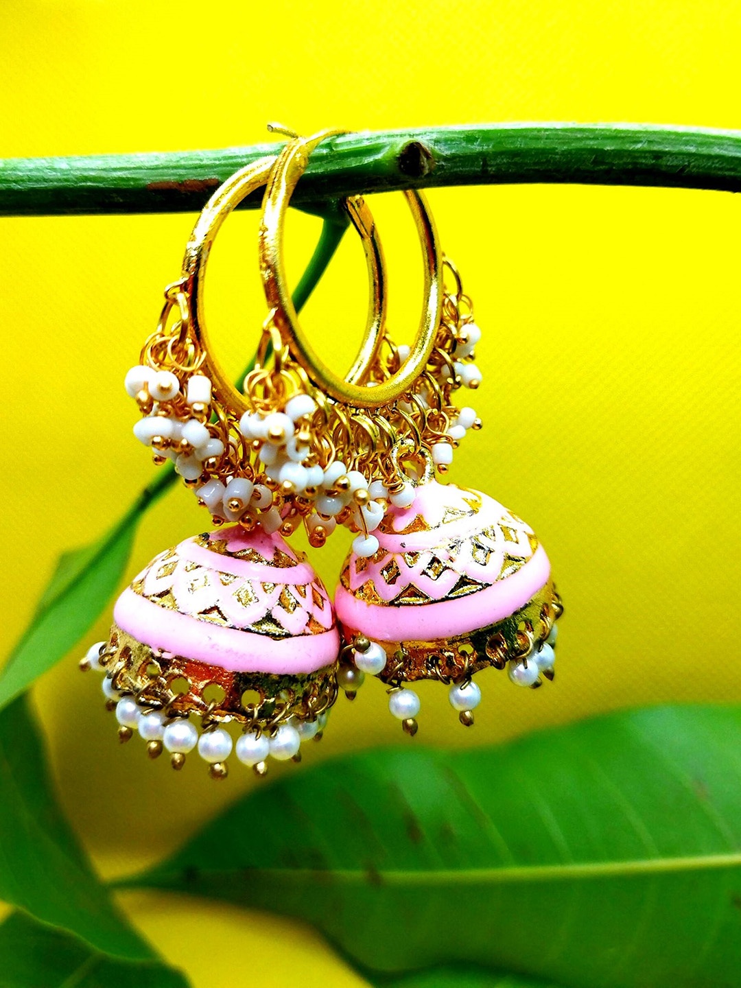

Kshitij Jewels Pink Gold-Plated Circular Jhumkas Earrings