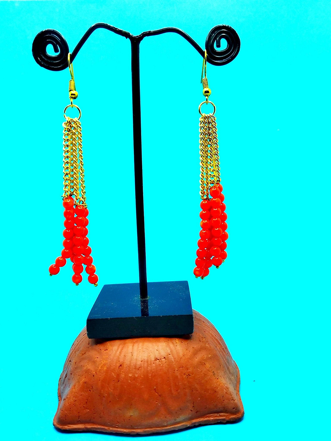 

Kshitij Jewels Orange Contemporary Drop Earrings