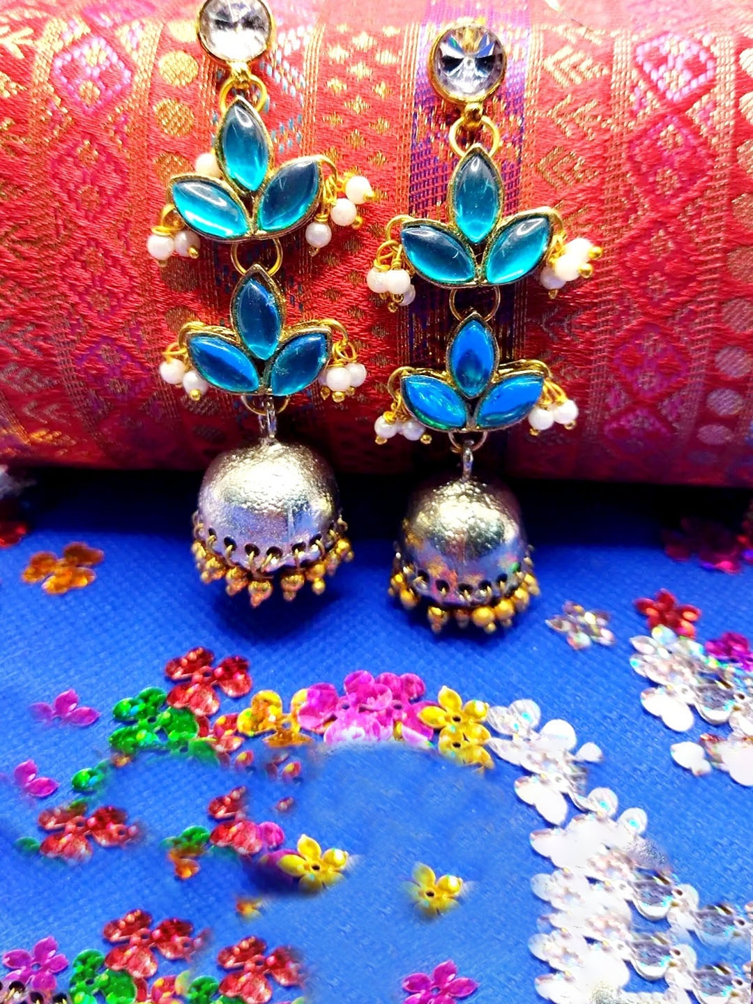 

Kshitij Jewels Blue Gold-Plated Leaf Shaped Jhumkas Earrings