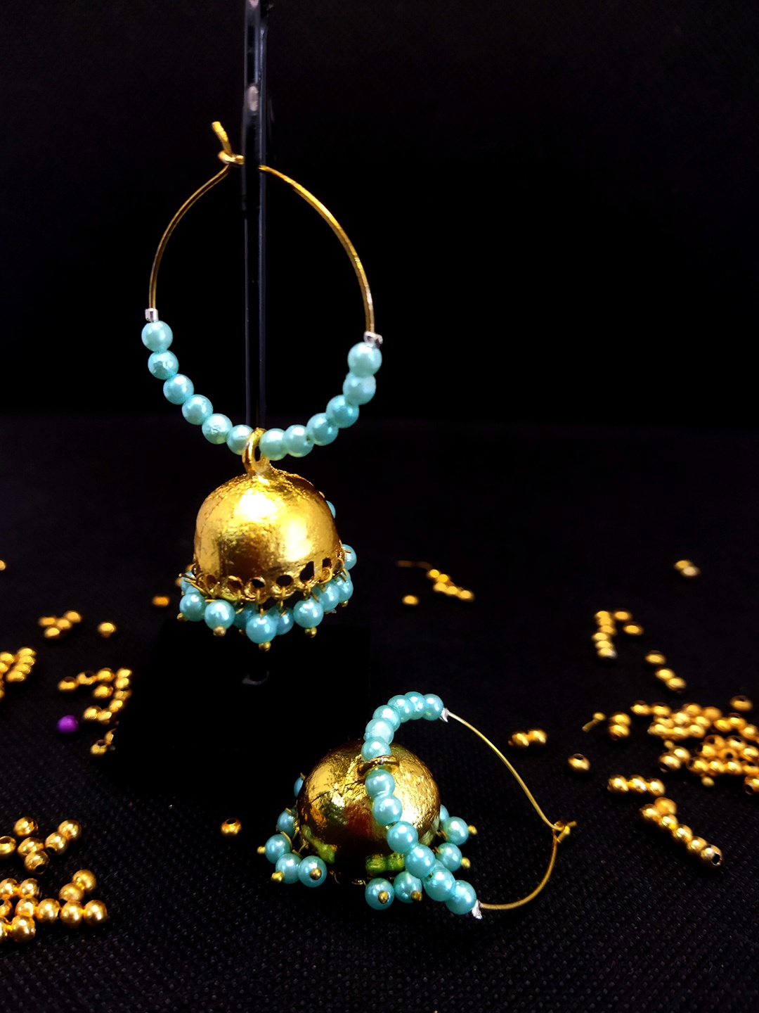 

Kshitij Jewels Women Gold-Toned & Turquoise Blue Circular Jhumkas Earrings
