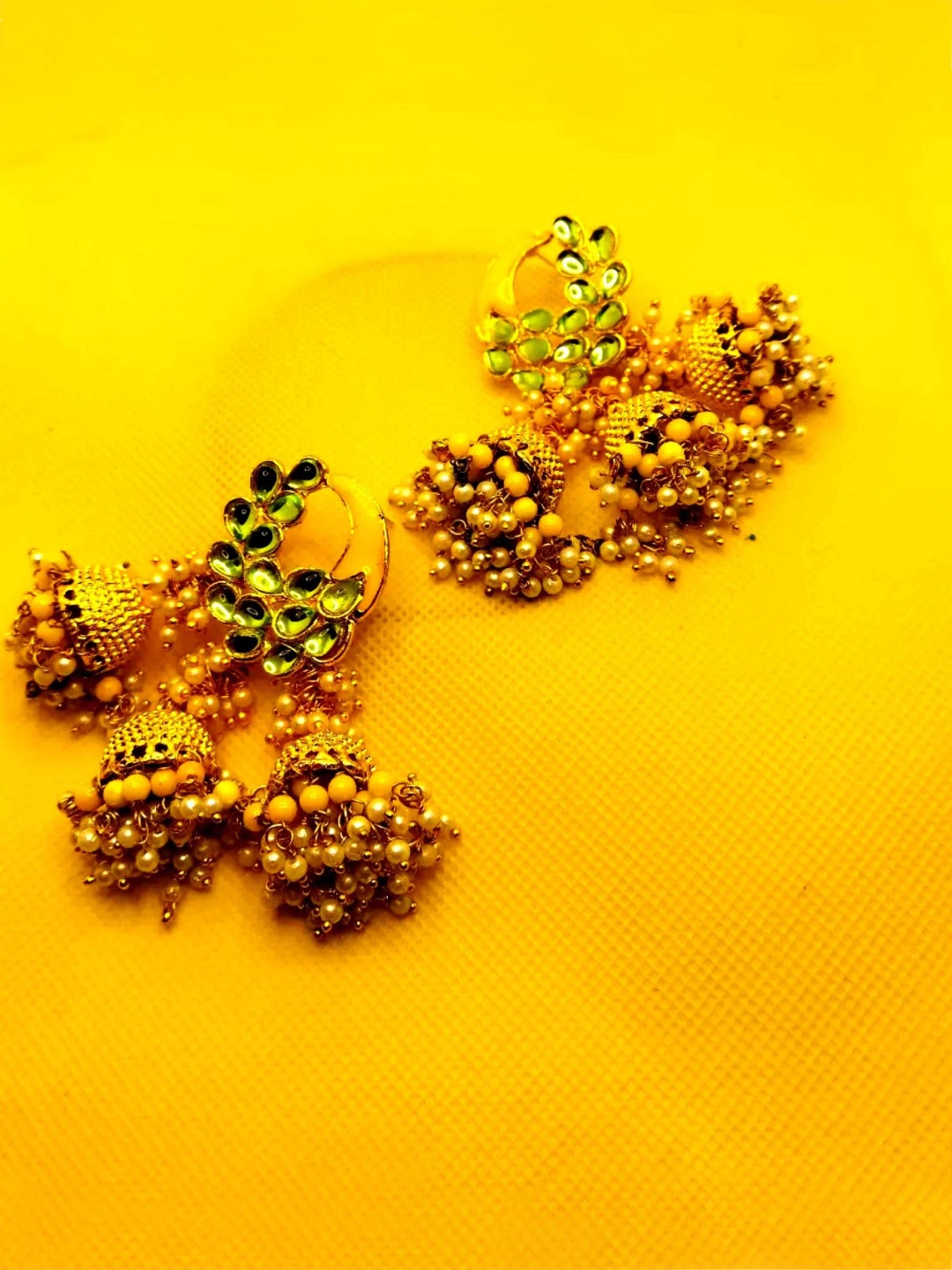 

Kshitij Jewels Yellow & Green Circular Jhumkas Earrings