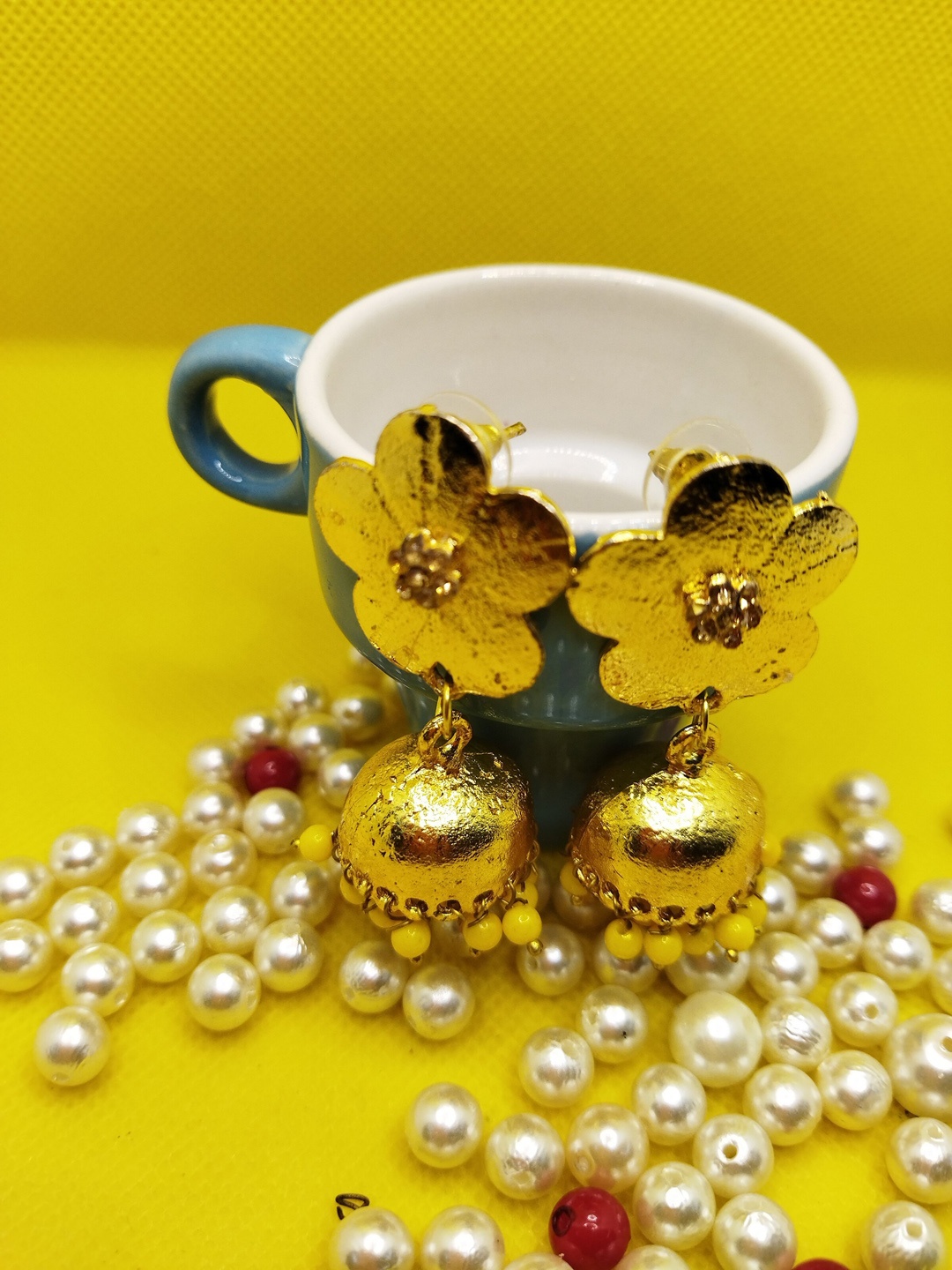 

Kshitij Jewels Yellow Dome Shaped Jhumkas Earrings