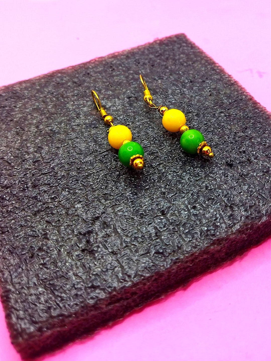 

Kshitij Jewels Women Gold-Toned & Yellow Circular Drop Earrings