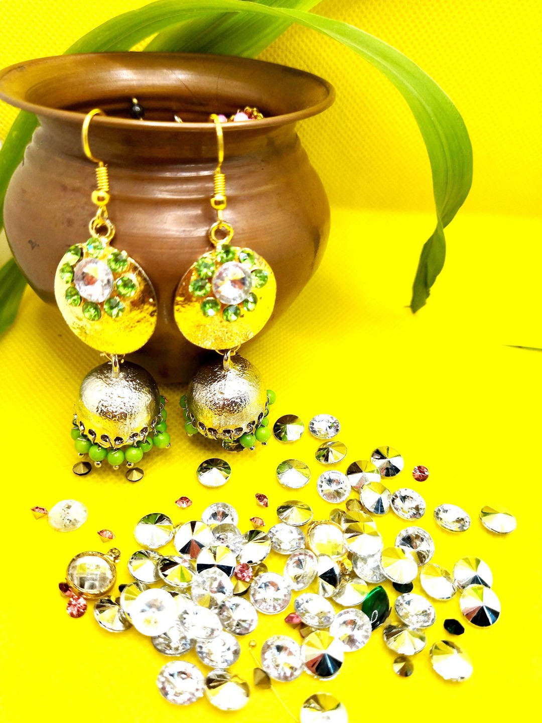 

Kshitij Jewels Women Fluorescent Green Silver-Plated Circular Jhumkas Earrings