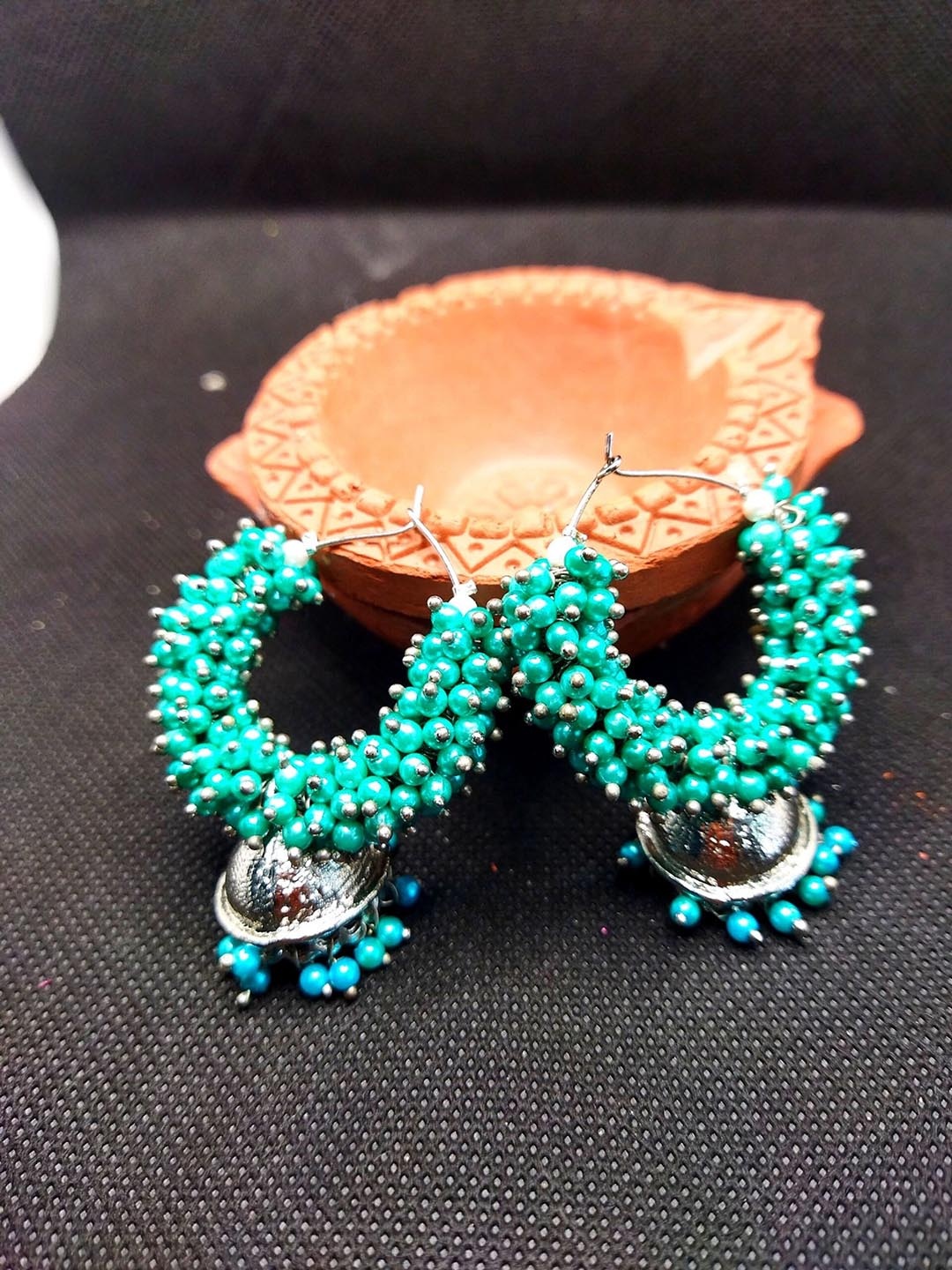 

Kshitij Jewels Teal Dome Shaped Drop Earrings