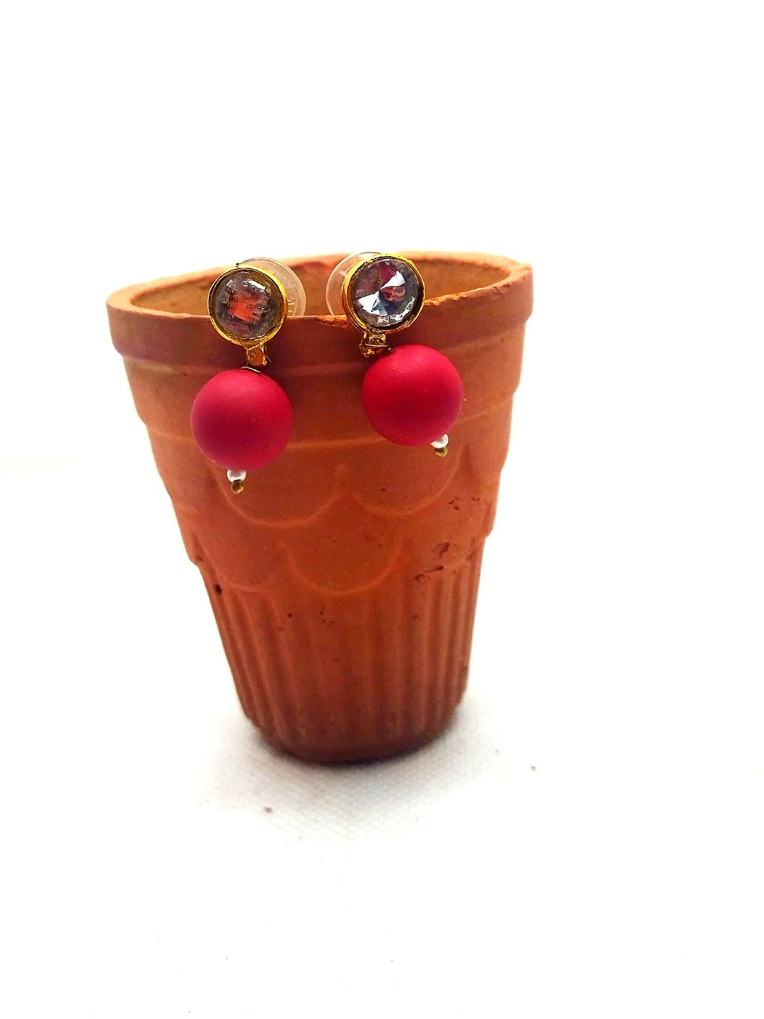 

Kshitij Jewels Red Teardrop Shaped Studs Earrings