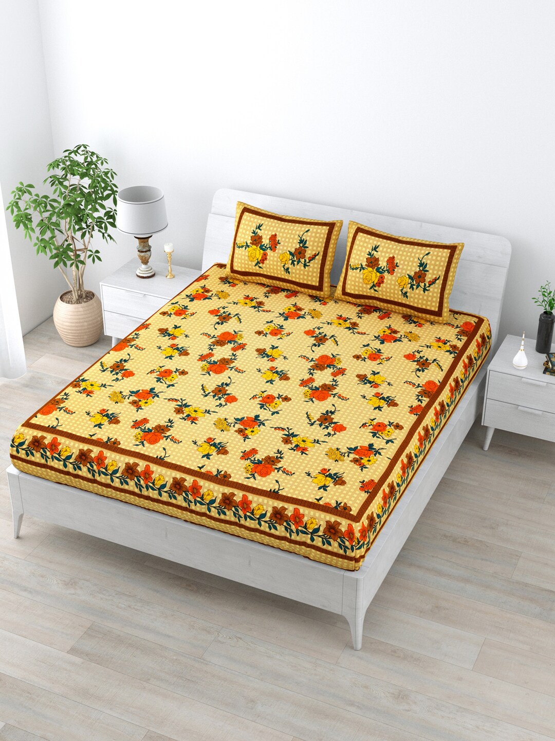 

LIVING ROOTS Yellow & Orange Floral Cotton 144 TC Queen Bedsheet with 2 Pillow Covers