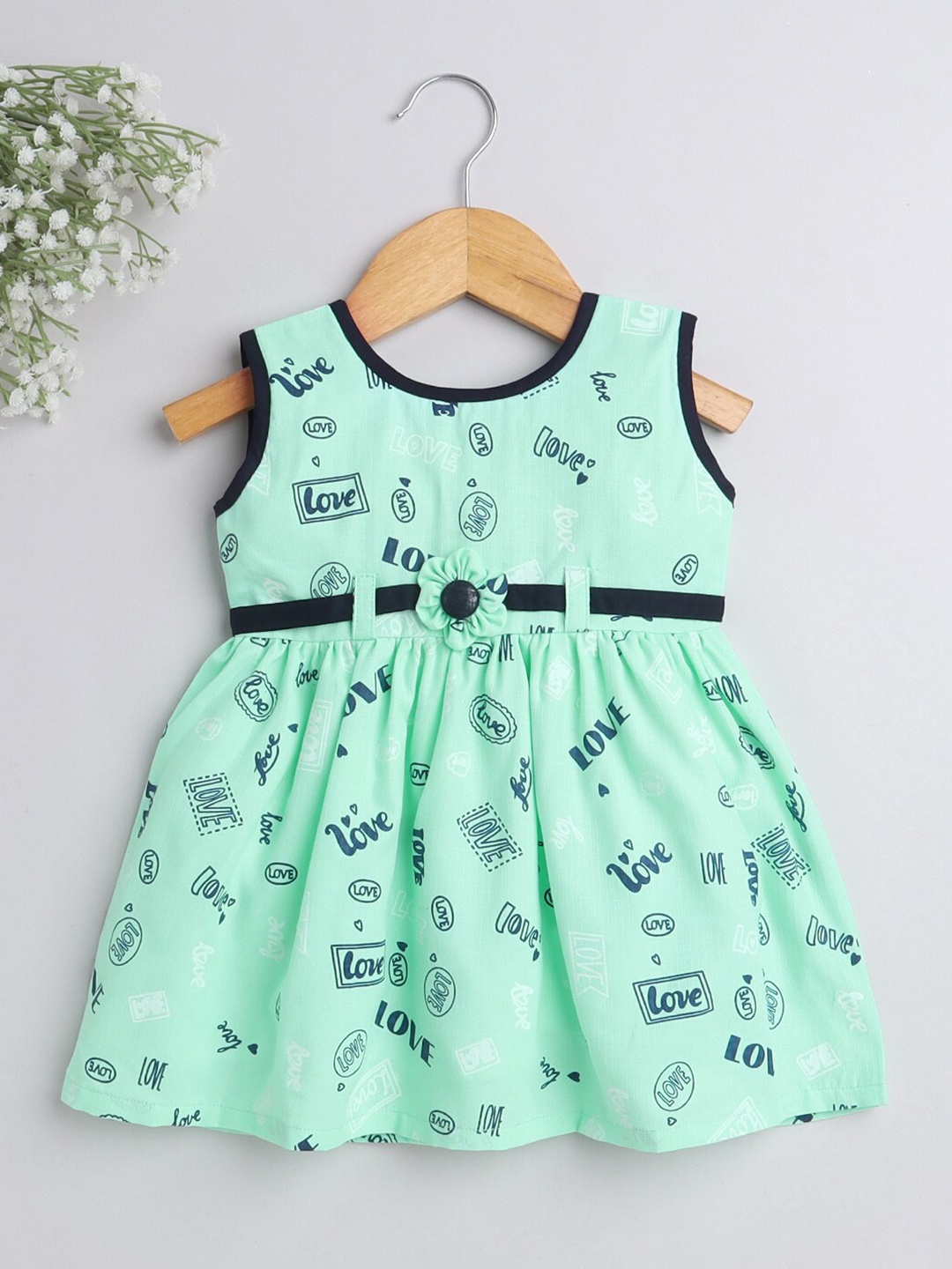 

The Magic Wand Girls Green & Black Conversational Printed A-Line Dress
