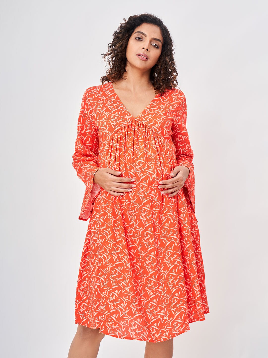 

Ed-a-Mamma Women Orange & White Printed Maternity Empire Dress