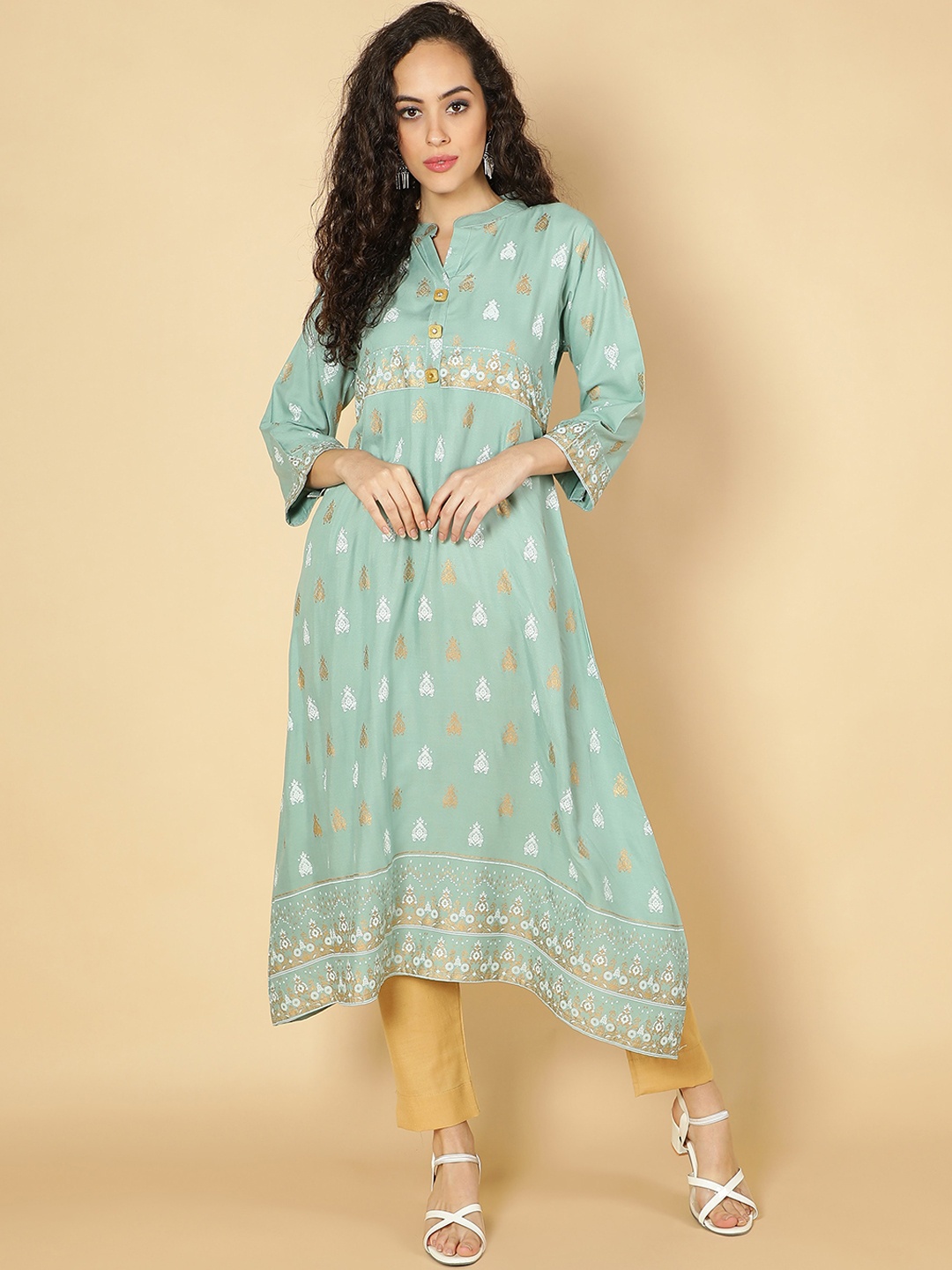 

Fabclub Women Turquoise Blue Ethnic Motifs Printed Kurta with Trouser