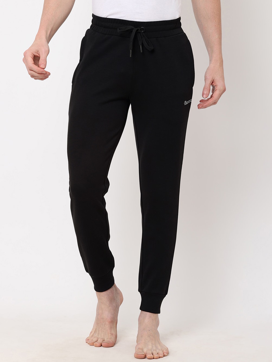 

Sweet Dreams Men Black Solid Track Pants