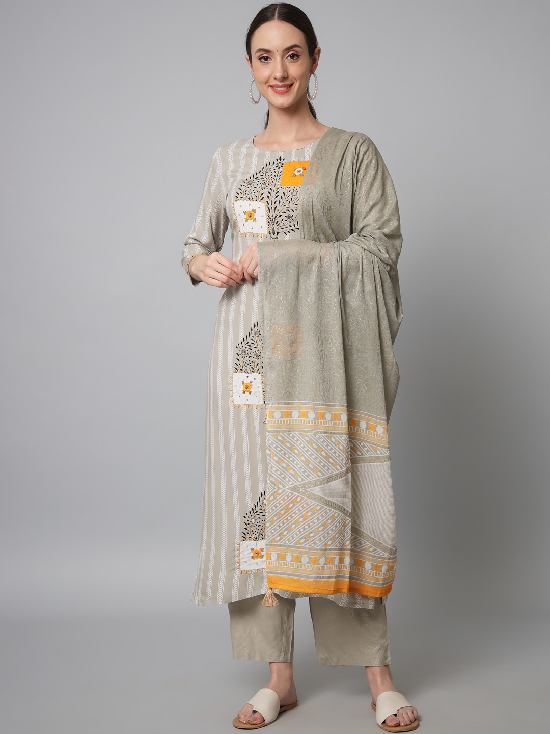 

Nehamta Women Grey Ethnic Motifs Printed Mirror Work Kurta with Trousers & Dupatta