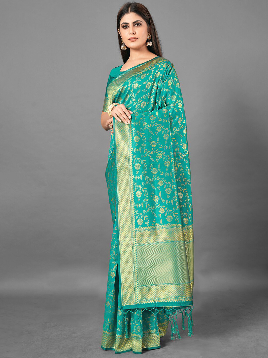 

Mitera Turquoise Blue & Gold-Toned Ethnic Motifs Zari Silk Blend Banarasi Saree