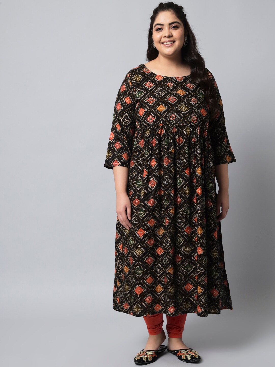 

Spera Women Plus Size Black & Orange Ethnic Motifs Printed High Slit Kurta