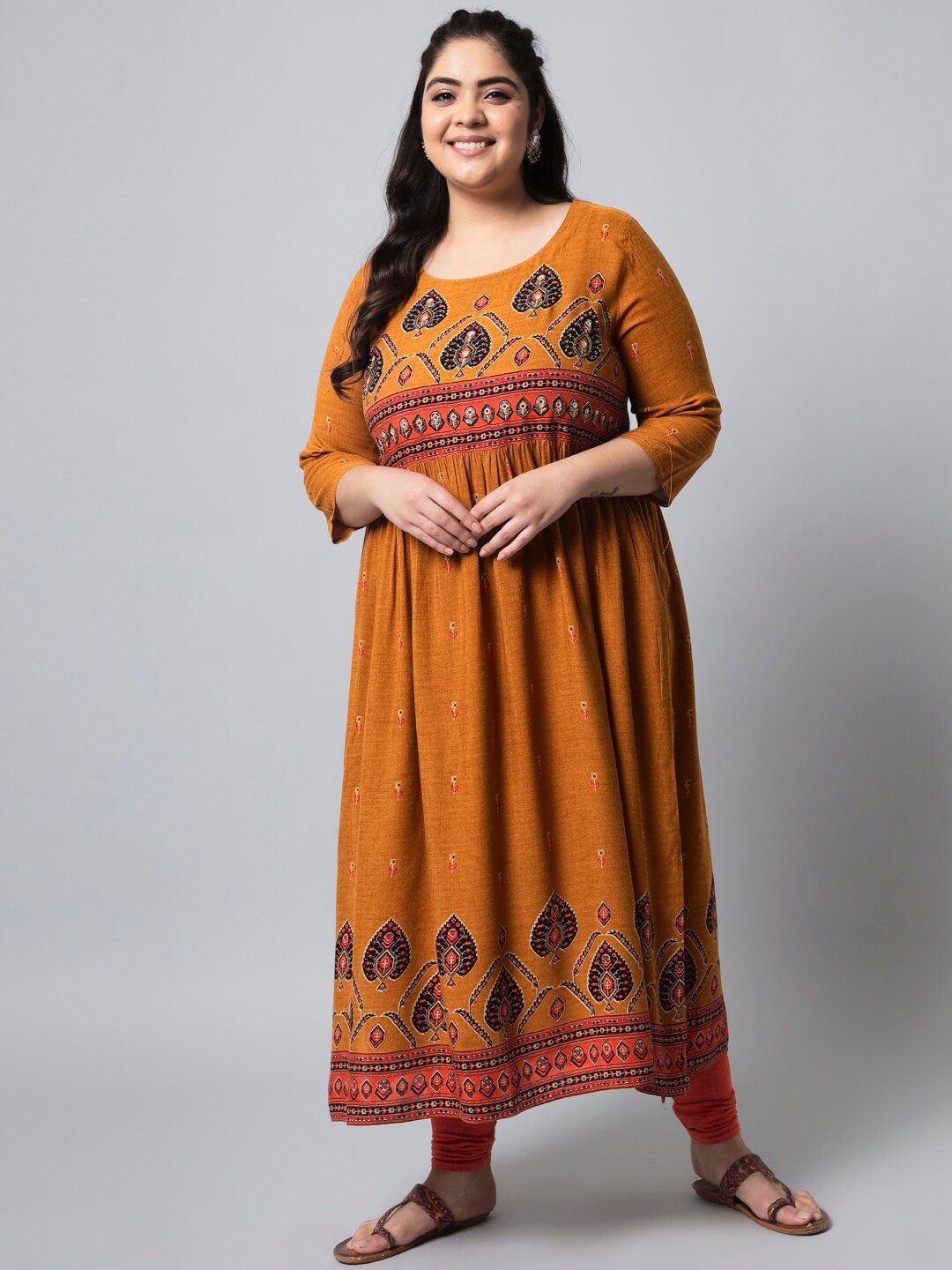 

Spera Women Mustard Yellow Ethnic Motifs Printed Thread Work Kurta