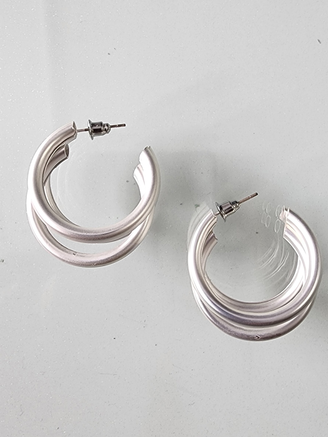 

Young & Forever Women Silver-Toned Circular Large Tube Half Hoop Earrings