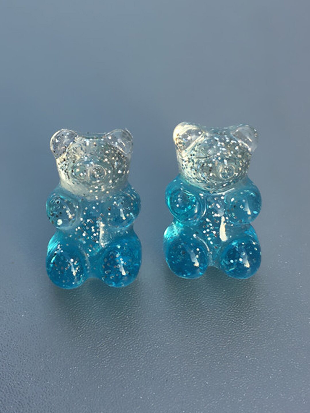 

Young & Forever Women Blue Animal Shaped Studs Earrings