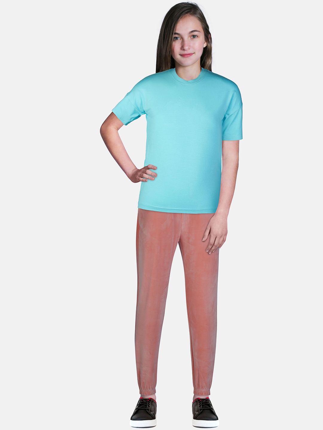 

Gini and Jony Girls Peach Solid Regular Fit Velvet Jogger