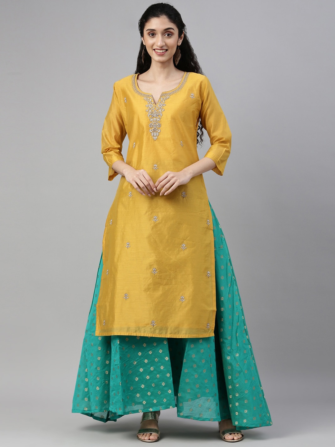 

NAYRA Women Yellow Embroidered Chanderi Silk Kurta with Skirt Set