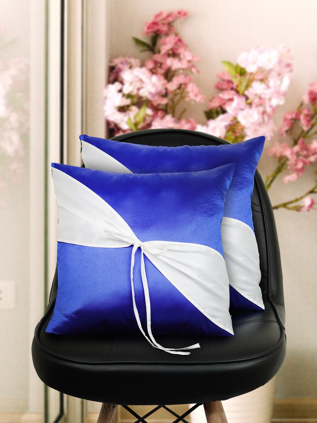 

Crazy Corner Blue Solid Cotton Square Cushion