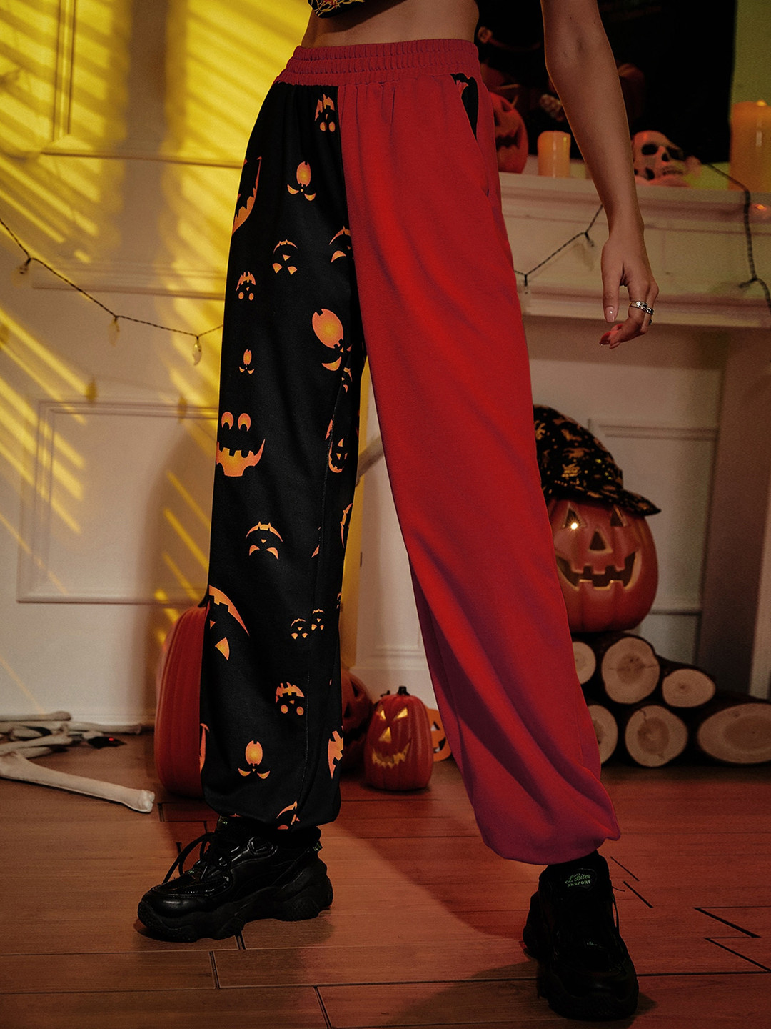 

BoStreet Women Orange Printed Tapered Fit Trousers