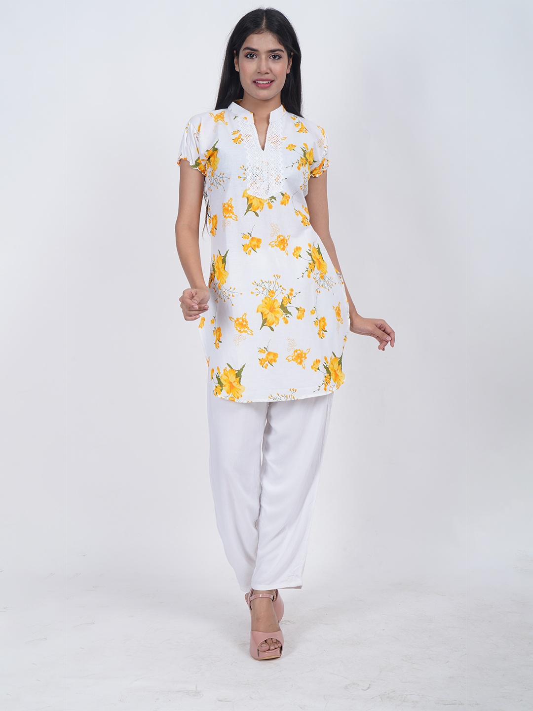 

Trendzmy Women White & Yellow Floral Printed Pure Cotton Kurti