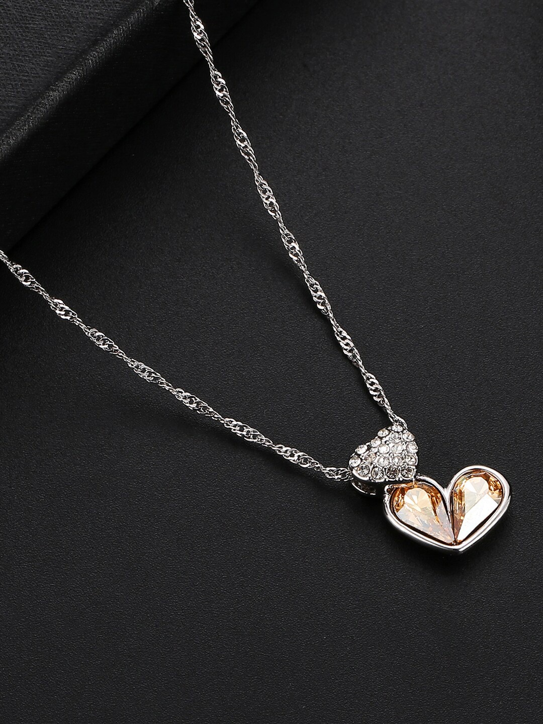 

Jewels Galaxy Yellow CZ Stone Studded Rhodium Plated Heart Pendant