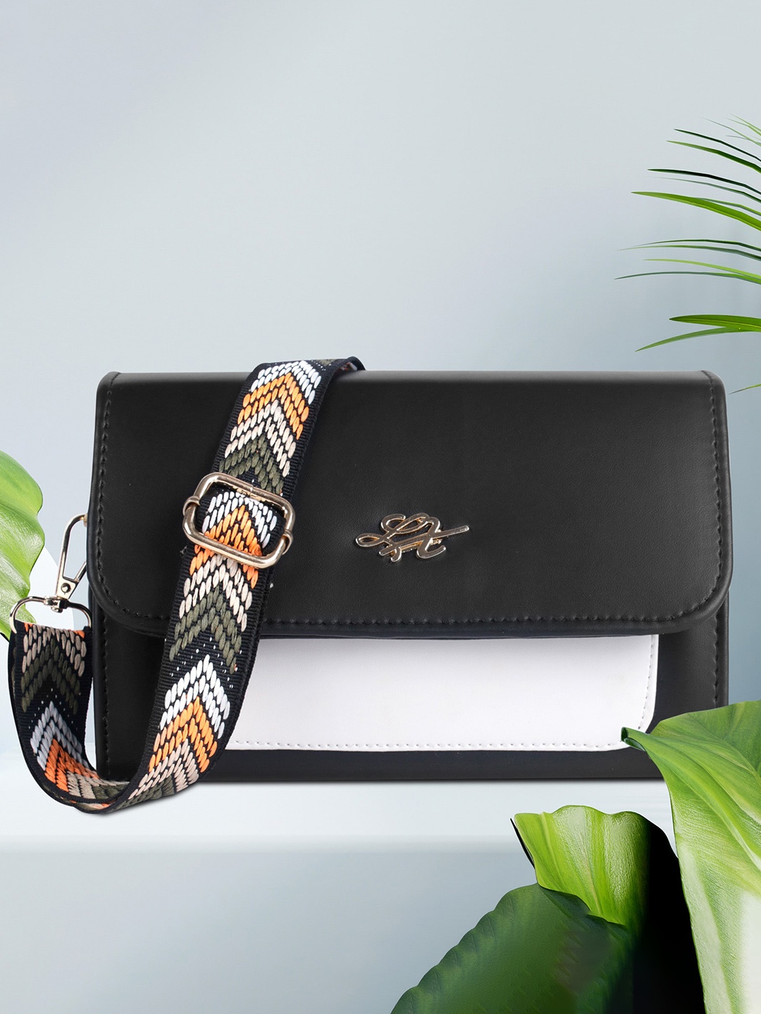 

LEKHX Black PU Structured Sling Bag
