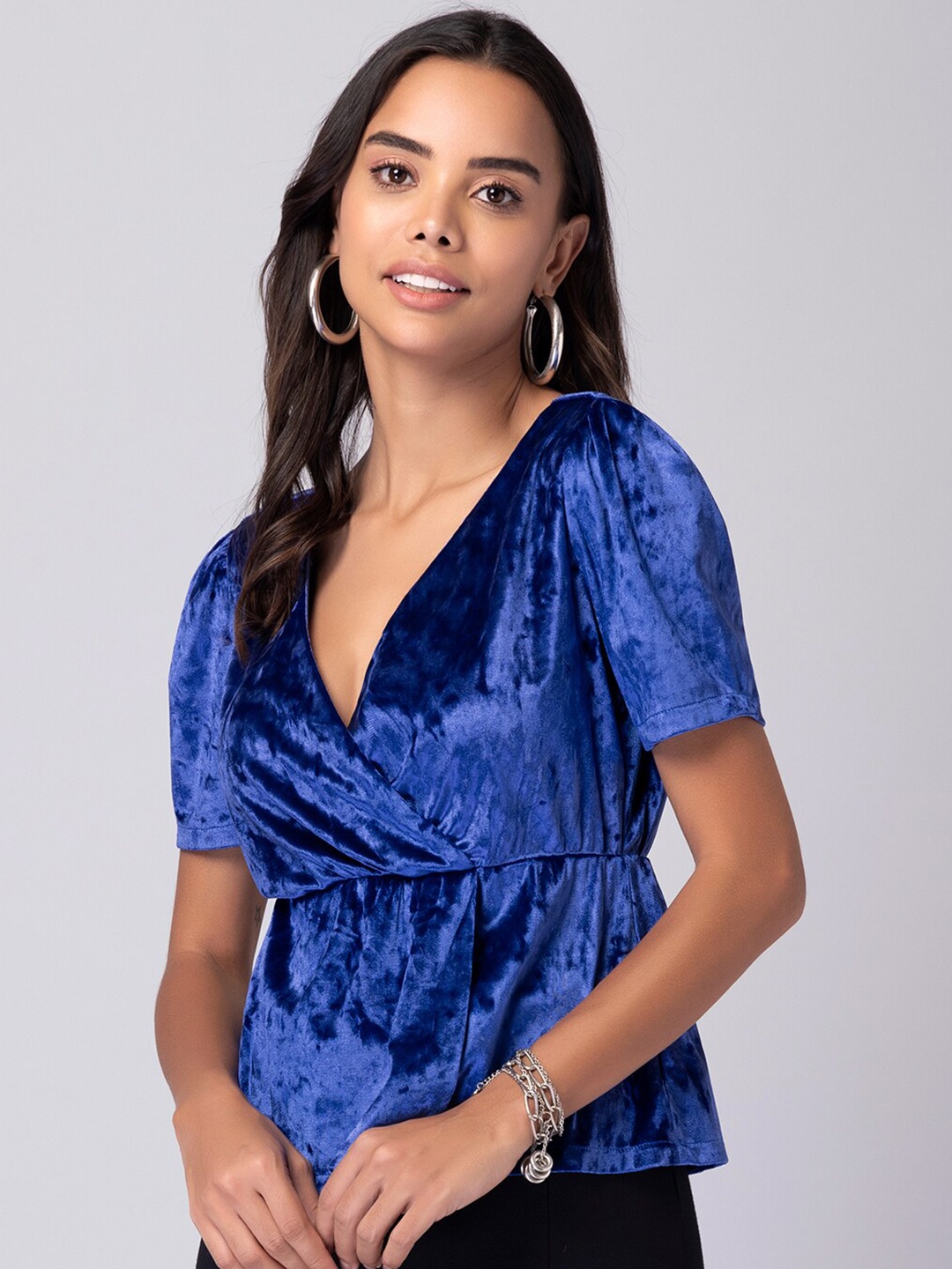 

FabAlley Women Blue Solid V-Neck Velvet Wrap Top