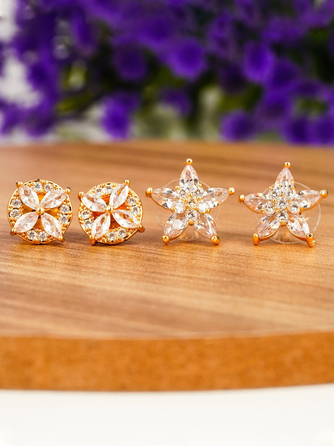 

Urmika Women Rose Gold & White Star Shaped Studs Earrings