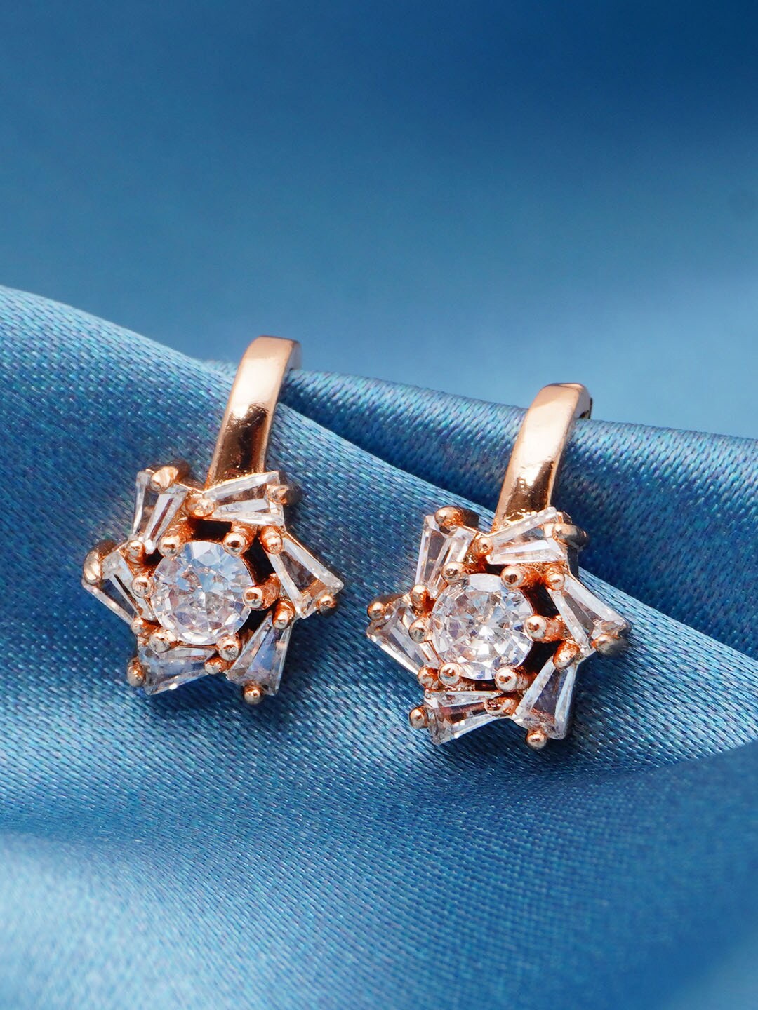 

Urmika Women Gold-Toned & Silver-Toned Floral Studs Earrings