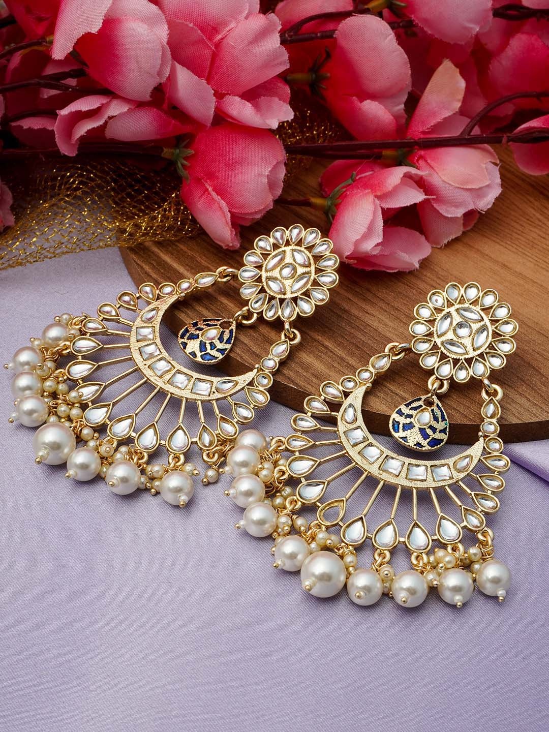 

Urmika Gold-Toned & White Circular Chandbalis Earrings