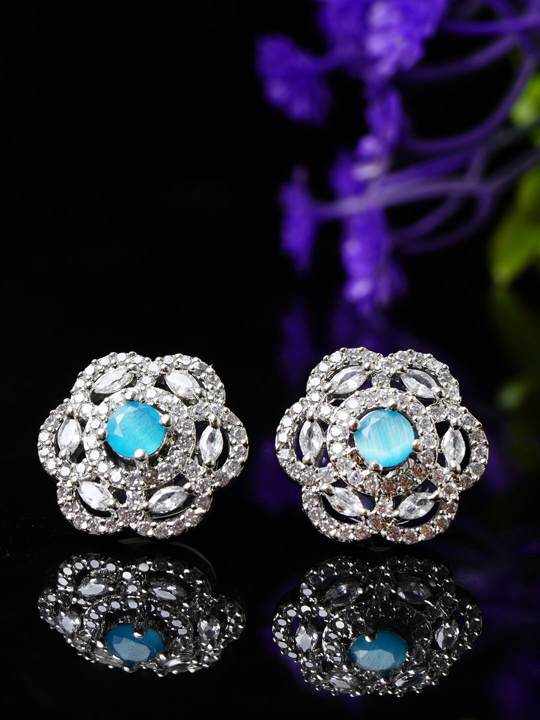 

Urmika Turquoise Blue & White Floral Studs Earrings