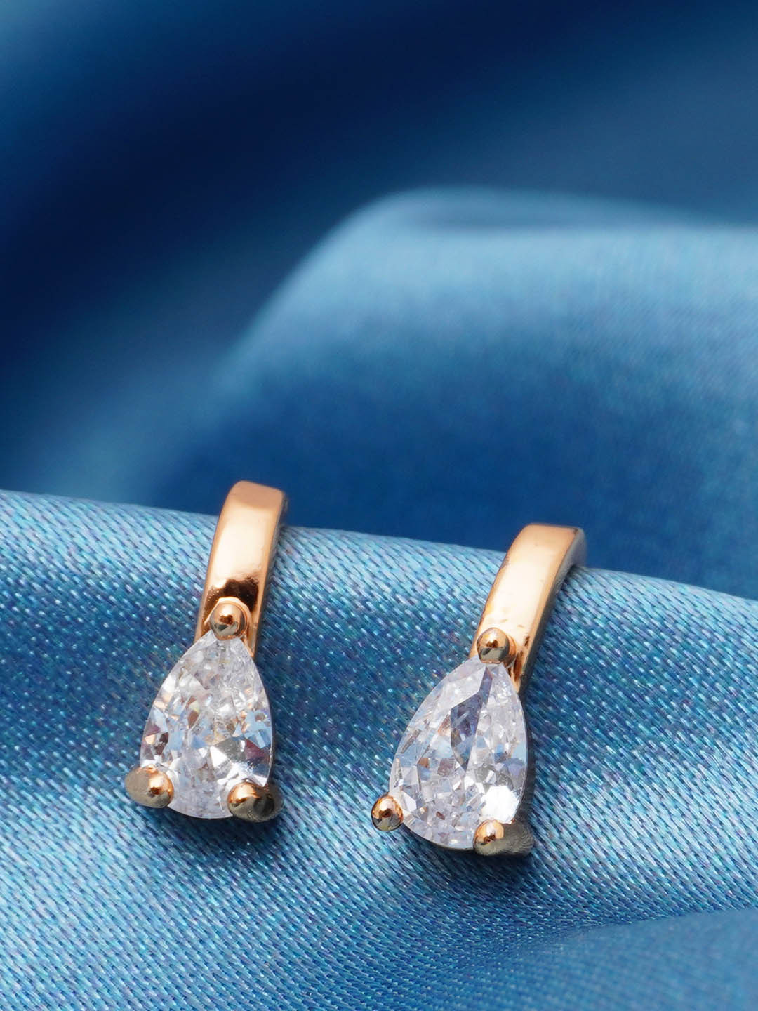 

Urmika Gold-Toned Teardrop Shaped Drop Earrings