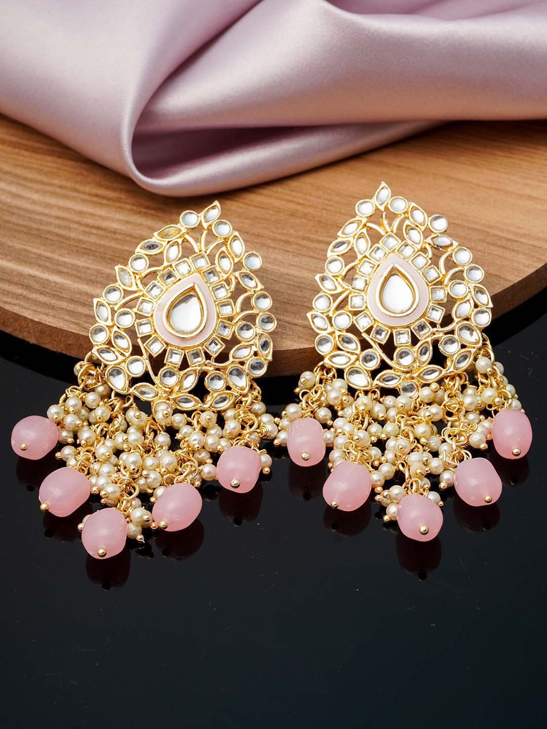 

Urmika Pink Teardrop Shaped Drop Earrings