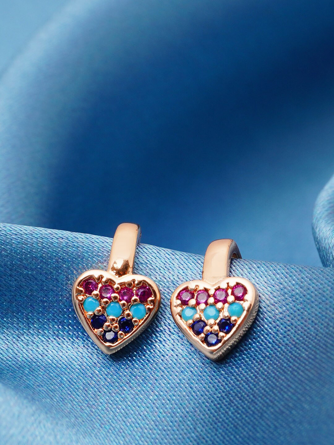 

Urmika Gold-Plated & Pink Heart Shaped Studs Earrings